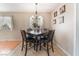 Cozy dining area with wood flooring and a window at 5804 Apple Valley Ln, Las Vegas, NV 89108