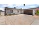 Lovely single-story home featuring an attached garage and desert landscaping at 5804 Apple Valley Ln, Las Vegas, NV 89108