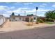 Single-story home with spacious driveway and low maintenance front yard at 5804 Apple Valley Ln, Las Vegas, NV 89108