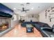 Open living room with fireplace and view into dining area at 5804 Apple Valley Ln, Las Vegas, NV 89108