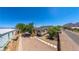 Aerial view of a charming single-Gathering home with gravel landscaping and a side street at 5822 E Carey Ave, Las Vegas, NV 89156