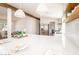 Bright kitchen boasts a large island, modern pendants, stainless appliances, and open layout at 5822 E Carey Ave, Las Vegas, NV 89156
