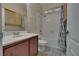 Well-maintained bathroom features single sink vanity and shower-tub combination at 5912 Kit Cove Ct, Las Vegas, NV 89131