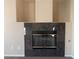 Close up of the fireplace with a marble surround at 5912 Kit Cove Ct, Las Vegas, NV 89131