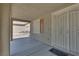View of a cozy and enclosed front porch and decorative security screen door offering privacy and curb appeal at 5912 Kit Cove Ct, Las Vegas, NV 89131
