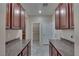 A spacious kitchen offers ample counter space and storage, with tile flooring at 5912 Kit Cove Ct, Las Vegas, NV 89131