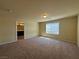 Large bedroom featuring neutral carpet, neutral walls and window at 6093 Crown Palms Ave, Las Vegas, NV 89139