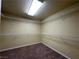 Walk-in closet equipped with wire shelving for storage at 6093 Crown Palms Ave, Las Vegas, NV 89139