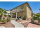 Inviting backyard showcasing a covered patio, built-in grill, and private pool surrounded by lush landscaping at 6329 Orange Hue St, North Las Vegas, NV 89031