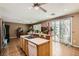 Cozy kitchen with a breakfast bar and sliding glass doors that provide ample natural light at 6329 Orange Hue St, North Las Vegas, NV 89031
