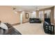 Inviting living area featuring neutral walls, carpet, and comfortable furnishings for relaxation and entertainment at 6329 Orange Hue St, North Las Vegas, NV 89031