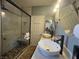 Bright bathroom with double sinks, granite countertop, and a spacious walk-in shower at 640 House Blend Ln, Henderson, NV 89052