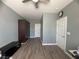 This bedroom has a ceiling fan, closet and wood floors with neutral paint and lots of light at 640 House Blend Ln, Henderson, NV 89052
