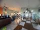Elegant dining room featuring an open floor plan, chandelier, and tile flooring at 640 House Blend Ln, Henderson, NV 89052