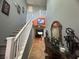 Home entryway featuring tall ceilings, stairs, and luxury design touches at 640 House Blend Ln, Henderson, NV 89052