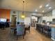 Open-concept living space connecting the dining area and kitchen at 640 House Blend Ln, Henderson, NV 89052