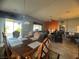 Large formal dining room open to a living space at 640 House Blend Ln, Henderson, NV 89052