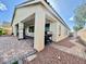 A covered patio with brick flooring, a ceiling fan, and a barbeque, perfect for outdoor entertaining at 640 House Blend Ln, Henderson, NV 89052