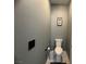 Small bathroom with a toilet and toilet paper holder at 640 House Blend Ln, Henderson, NV 89052