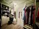 Well-organized walk-in closet with shelving, hanging rods, and ample space for efficient storage solutions at 640 House Blend Ln, Henderson, NV 89052
