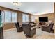 Comfortable living room with plush seating, and neutral colors, perfect for relaxation and entertaining at 6409 Sea Swallow St, North Las Vegas, NV 89084