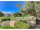 Backyard view of a neighborhood park, providing a green space for recreation and relaxation at 6409 Sea Swallow St, North Las Vegas, NV 89084