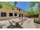 Inviting backyard patio with outdoor dining area and lounge seating, perfect for entertaining guests at 6409 Sea Swallow St, North Las Vegas, NV 89084