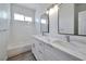 Bathroom features double vanity with marble countertop at 6509 Alpine Winter Ct, Las Vegas, NV 89149