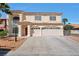 Charming two-story home featuring a stucco facade, a red tiled roof, and a spacious three-car garage at 6509 Alpine Winter Ct, Las Vegas, NV 89149