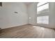 Bright living room with hardwood floors and vaulted ceiling at 6509 Alpine Winter Ct, Las Vegas, NV 89149
