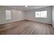 Spacious living room with hardwood floors and natural light at 6509 Alpine Winter Ct, Las Vegas, NV 89149