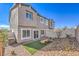 Charming backyard with artificial grass, gravel landscaping, perfect for relaxing outdoors at 6533 Cinnamon Hazelnut St # Lot 94, North Las Vegas, NV 89084