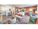 Spacious area connects living, dining, and kitchen, featuring chic decor and ample seating at 6533 Cinnamon Hazelnut St # Lot 94, North Las Vegas, NV 89084