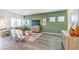Comfortable living area with contemporary decor and a cozy seating arrangement at 6533 Cinnamon Hazelnut St # Lot 94, North Las Vegas, NV 89084