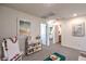 Bright loft with a skylight, artwork, and open doorways, offering flexible living space and natural light at 6533 Cinnamon Hazelnut St # Lot 94, North Las Vegas, NV 89084