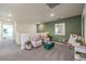 Cozy loft area with comfortable seating, neutral tones, a skylight, and stylish decor, perfect for relaxation at 6533 Cinnamon Hazelnut St # Lot 94, North Las Vegas, NV 89084