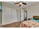 Bright bedroom with carpet, closet, and an ensuite bathroom at 680 Moonlight Stroll St, Henderson, NV 89002