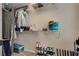 Organized walk-in closet with shelving and ample storage for clothes, shoes and accessories at 680 Moonlight Stroll St, Henderson, NV 89002