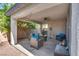 Backyard covered patio with comfortable seating, perfect for outdoor living at 680 Moonlight Stroll St, Henderson, NV 89002