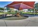 Shaded playground with climbing structures, slide, and a soft, safe play surface for  at 680 Moonlight Stroll St, Henderson, NV 89002