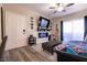 Comfortable living room featuring stylish decor and modern media setup at 6955 N Durango Dr # 2081, Las Vegas, NV 89149