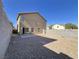 This backyard features a patio and gravel at 7249 Old Glory St, Las Vegas, NV 89148