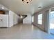 Large open-concept space with tile flooring, recessed lighting and a backyard view at 7249 Old Glory St, Las Vegas, NV 89148