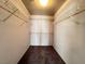 This walk-in closet features shelving, carpeting, and ample storage space at 7249 Old Glory St, Las Vegas, NV 89148