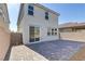 A spacious, private backyard area with stone pavers, perfect for outdoor entertaining and relaxation at 7256 Saxby Ave, Las Vegas, NV 89113
