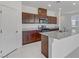 Well-equipped kitchen featuring granite counters, ample cabinetry, and stainless steel appliances for cooking convenience at 7256 Saxby Ave, Las Vegas, NV 89113