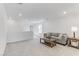 Spacious loft with carpet flooring, recessed lights, and a comfortable seating area at 7256 Saxby Ave, Las Vegas, NV 89113
