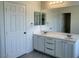 Bright bathroom boasts dual sinks, ample counter space, and updated fixtures at 740 White Grotto St, Las Vegas, NV 89138