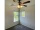 Cozy bedroom with natural light, ceiling fan, and neutral color scheme at 740 White Grotto St, Las Vegas, NV 89138