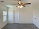 This bedroom features neutral walls, plush carpet and a ceiling fan at 740 White Grotto St, Las Vegas, NV 89138